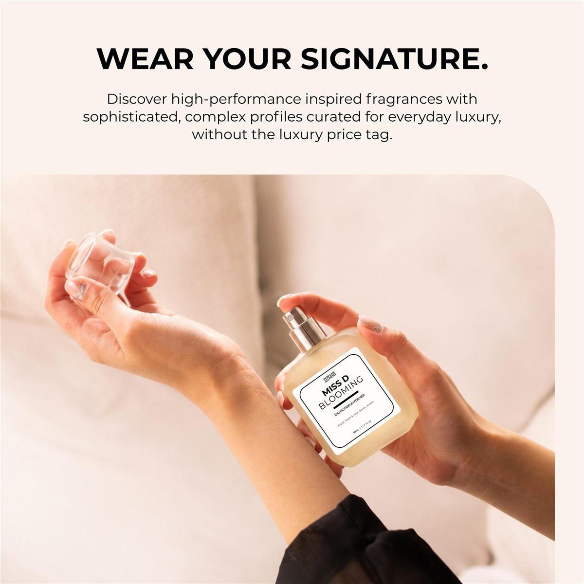 Applying Miss D Blooming perfume